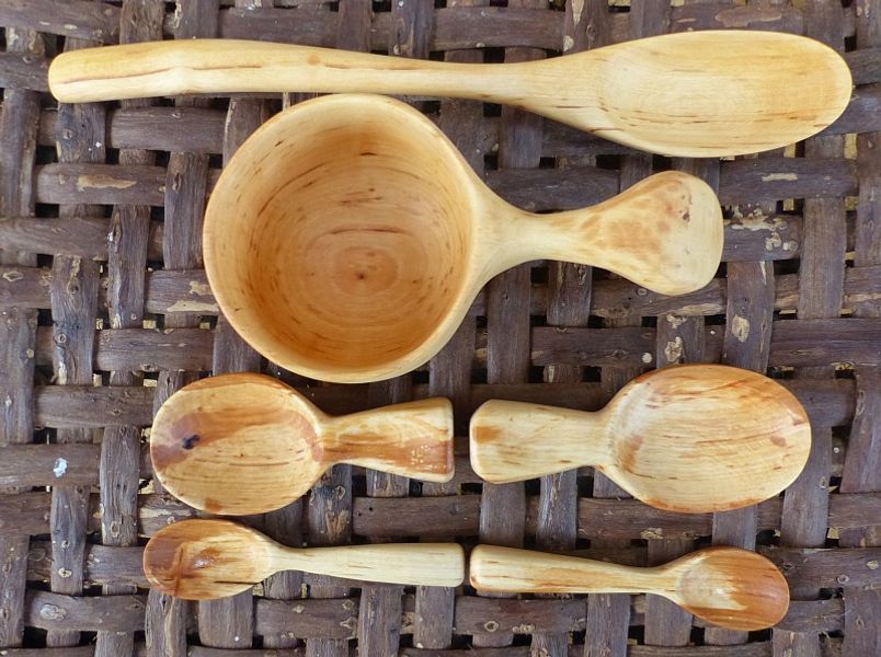 A variety of items carved in green Alder