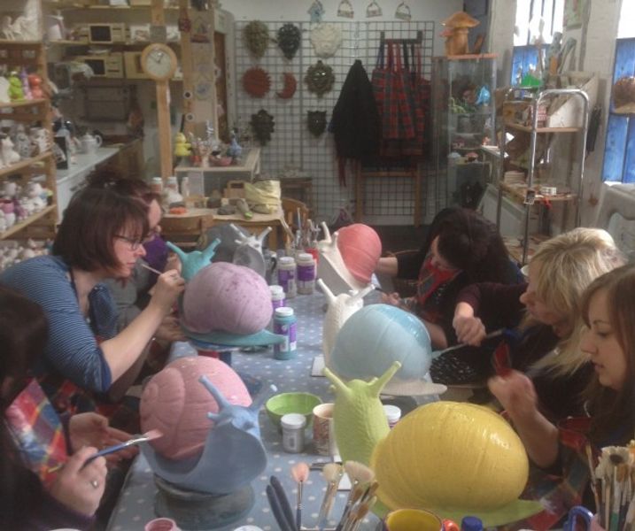 Students on a snail painting workshop in Wordsley