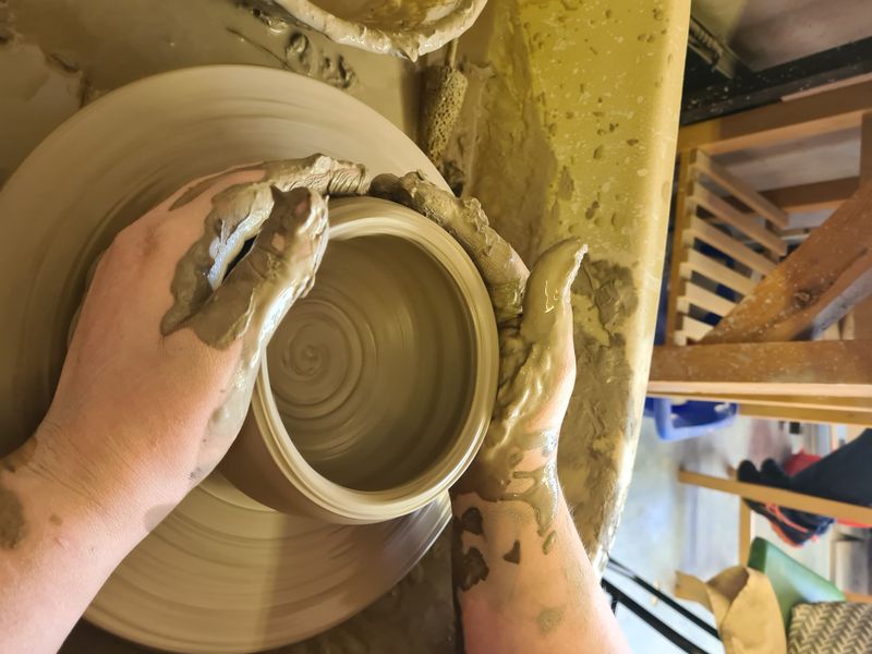 Throwing on the potters wheel