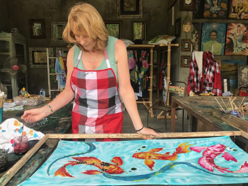 Barbara painting koi carp in Bali