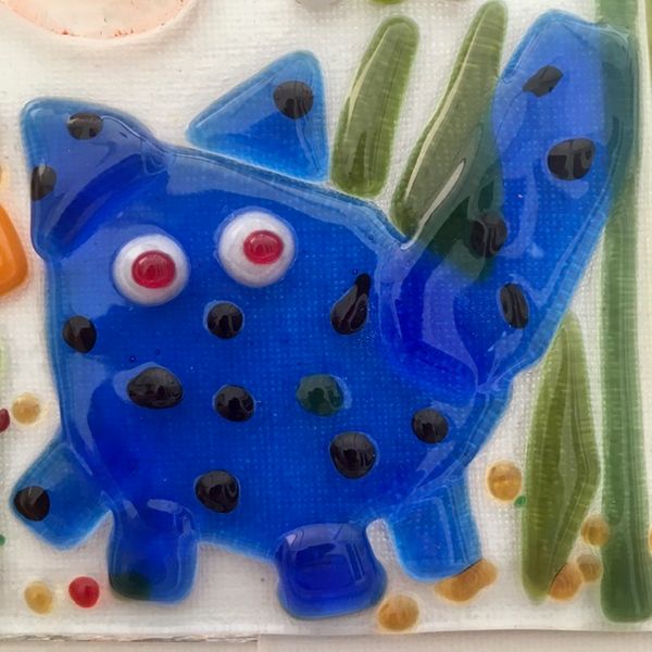 Detail view of a 15cm sq fused Glass Panel, created at the Kittys & Puppies in the Garden Workshop