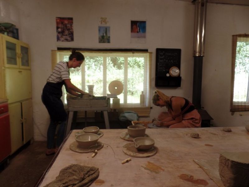 Students throwing on the Potters Wheel in Salhouse Norwich