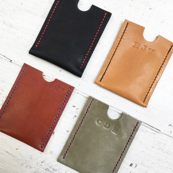 4 embossed card cases