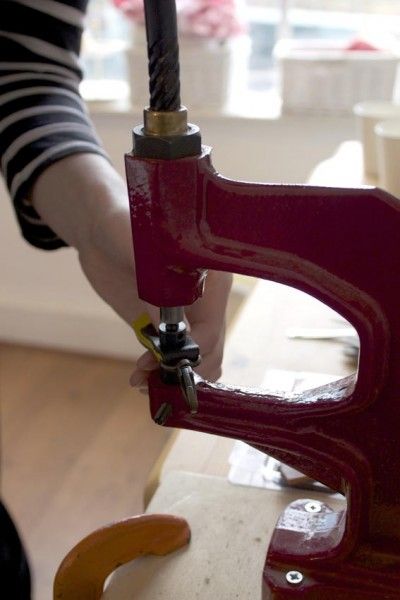 Rivet tooling two tone leather key rings with a rivet press