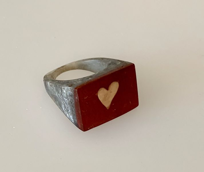 Ring with tiny heart charm