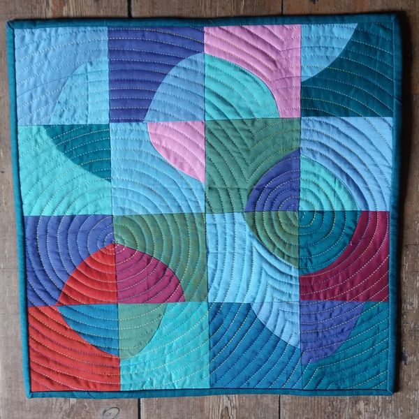 Spiral quilting on freehand curves