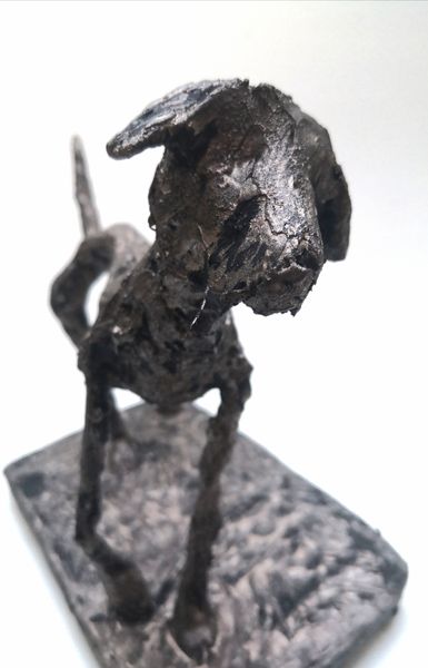 Giacometti style dog by student. Black bronzed finish.