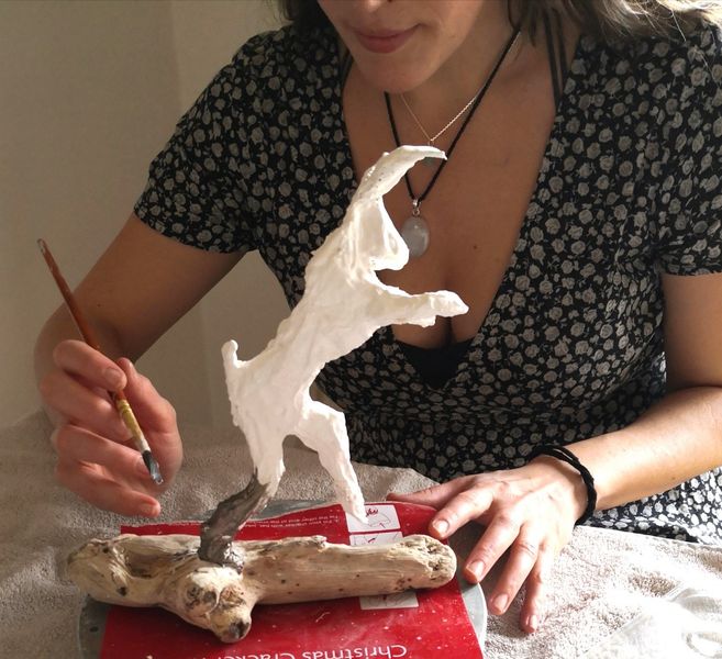 A student bronzing her Hare.