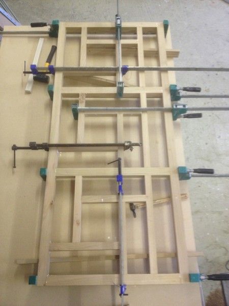 Complicated glue up of frame in woodworking course