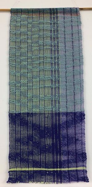 A woven wall hanging