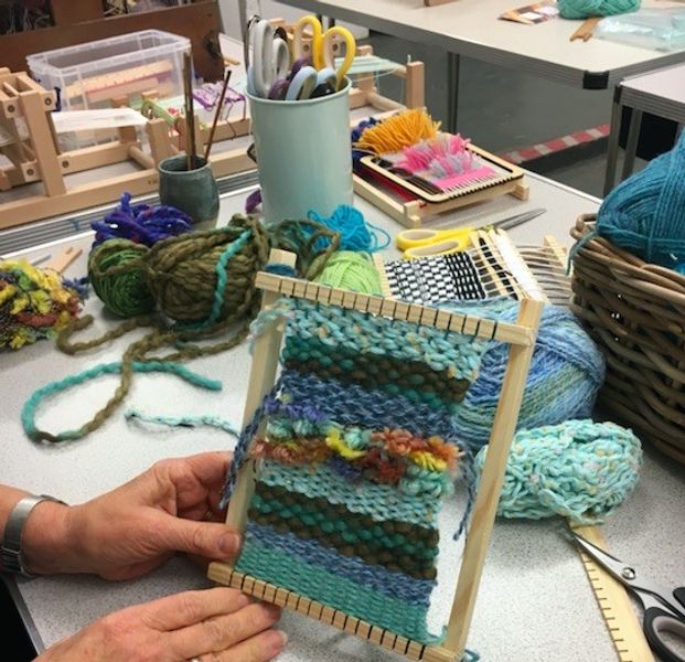 A students woven tapestry wall hanging