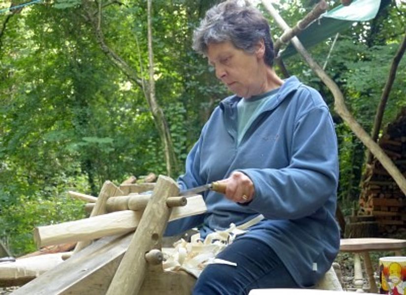 Shaping a chair leg with a draw-knife