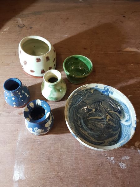 A range of beautiful pots from a first time potter.