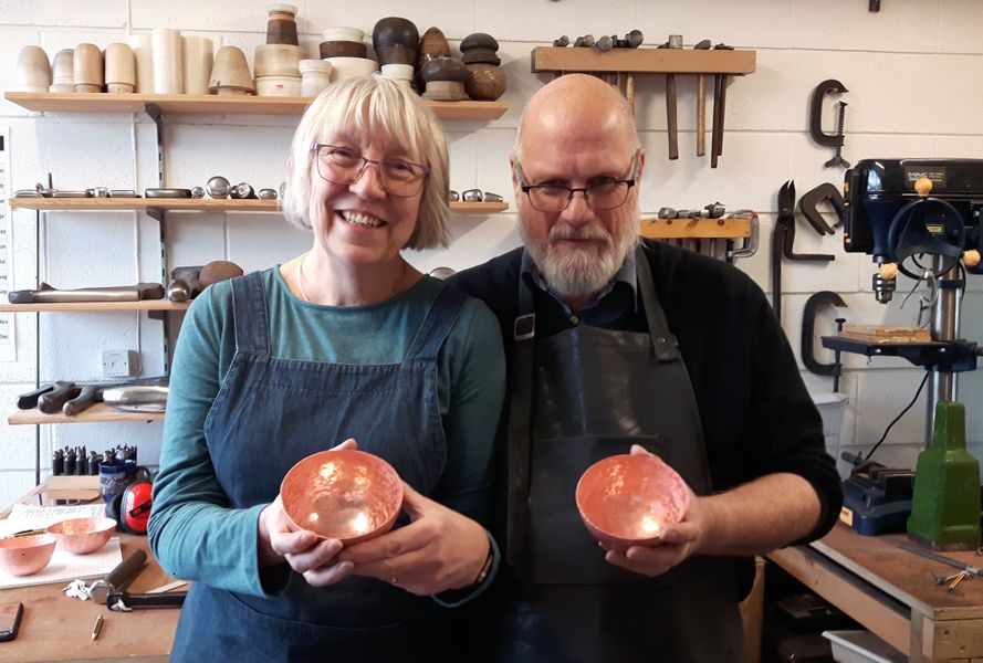 Lynne and Tom looking pleased with their finished bowls.