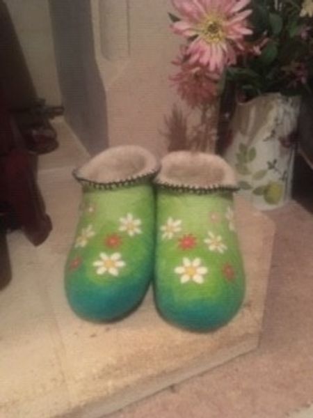 Finished slippers with embelished prefelt flowers.