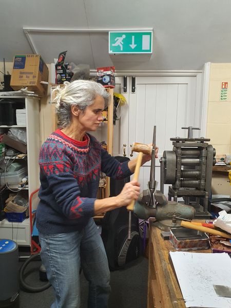 Student Forming a Silver Ring at Brightsmiths Workshops