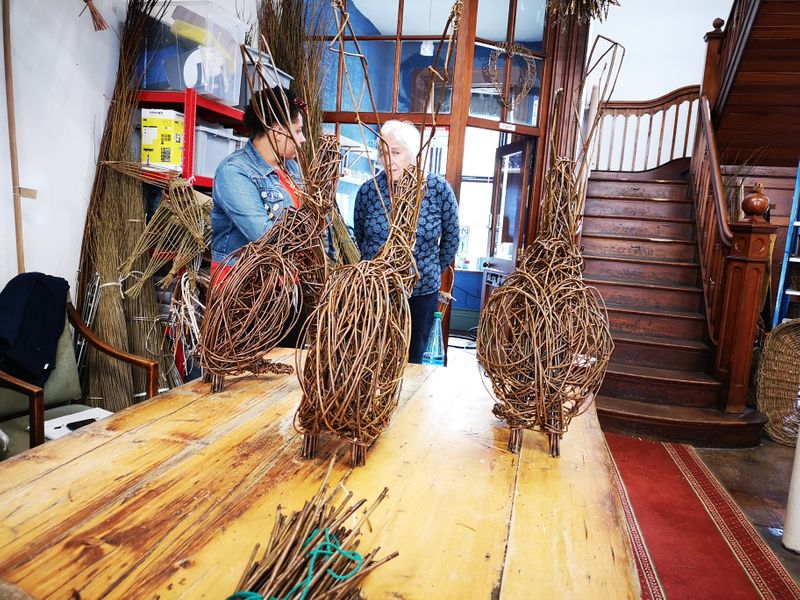 students finished weaving willow hare