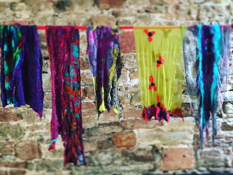 Selection of students finished scarves hanging to dry