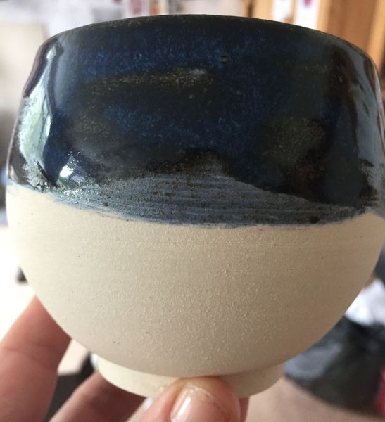 Thrown pot - fired and glazed in a rich blue.