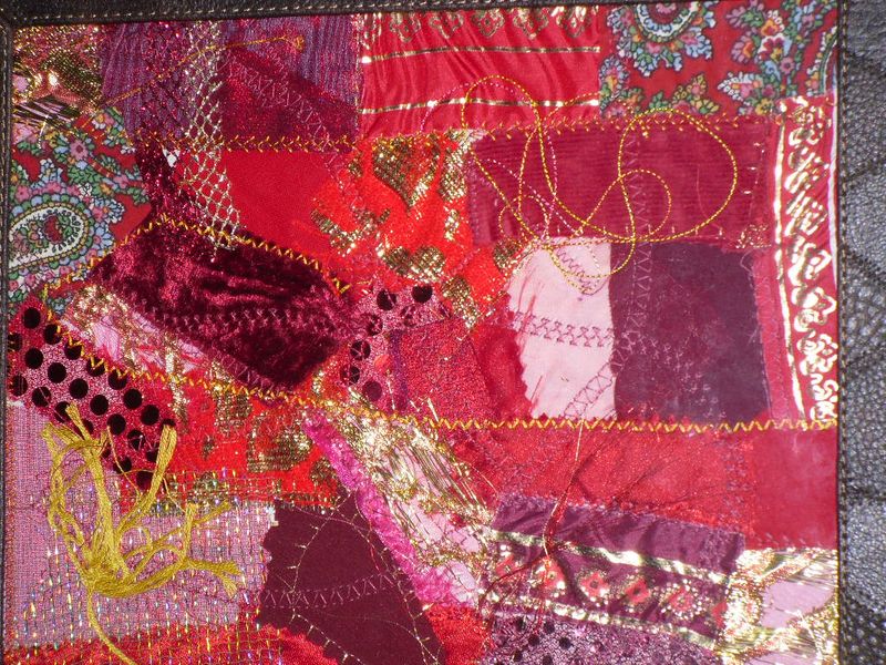 Eastern Look Crazy Patchwork
Lots of different red fabrics with creative stitching