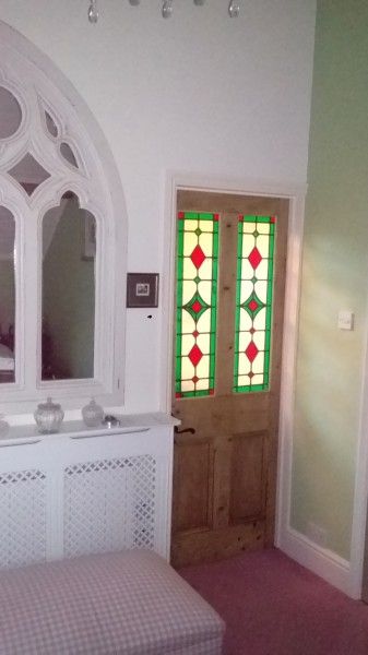 Stained glass leaded lights made on a weekly course in Chilham and installed by the student into his home.
