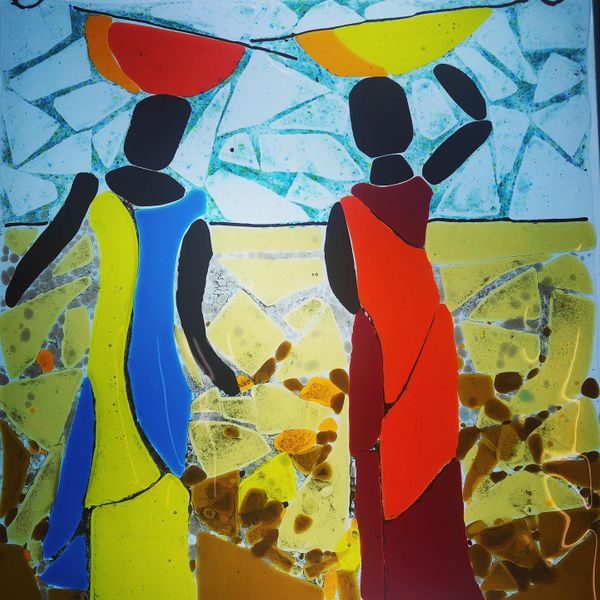Wall panel African ladies carrying baskets, beautifully made by Sarah on our beginners day course at Rainbow Glass Studios