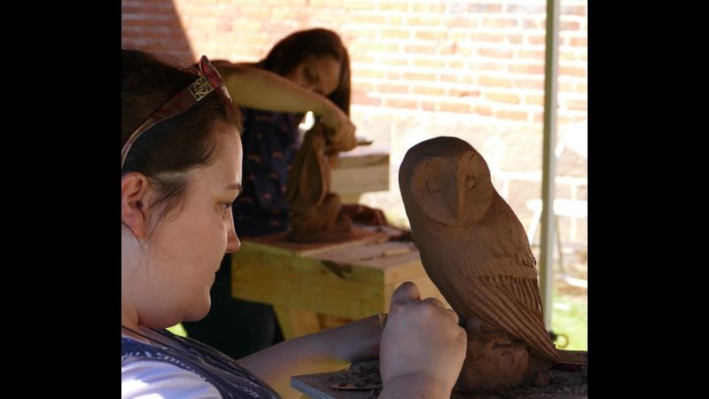 Clay sculpture group