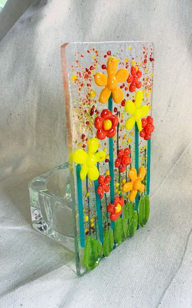 Candle holder with ‘glass powder’ flowers ( a small bag of 5 hand made & pre-fired flowers can be purchased on the day.