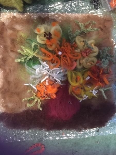 Laying the coloured fibres down to create the composition. Produced at my Masterclass near Wickham,