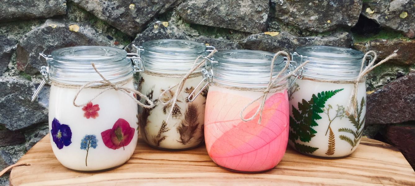 Decoupage your jar with your choice of pressed flowers, leaves and feathers.