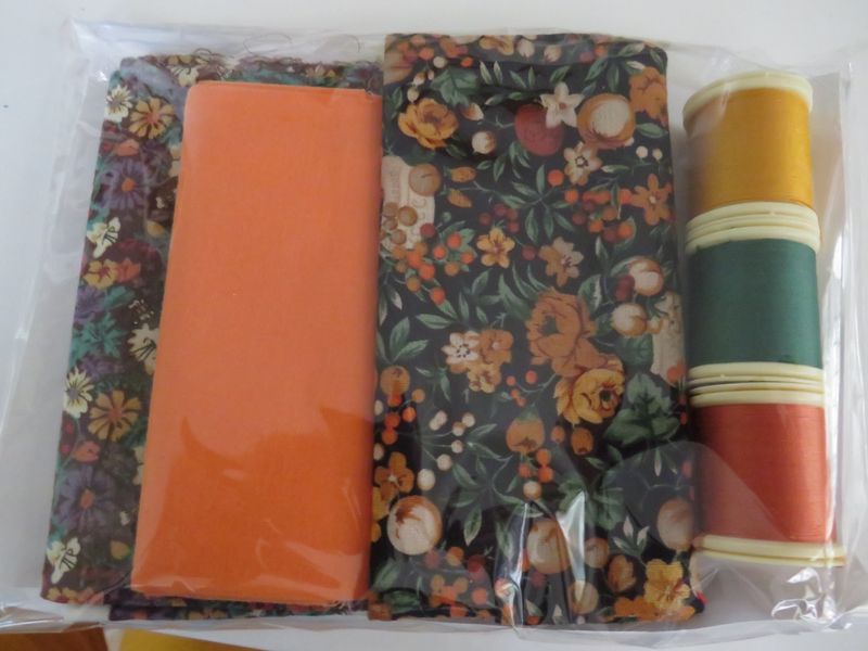 Starter sewing kit with fat quarter bundle of fabric and a cotton