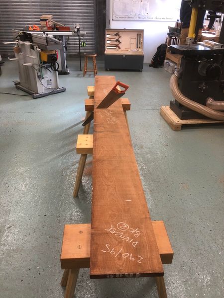 My saw benches in use, using two pairs to secure long planks, when cross cutting