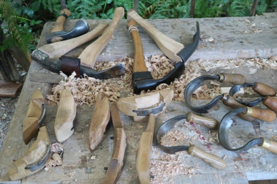 Some of the traditional tools we use to shape the classic seat of a Windsor chair.