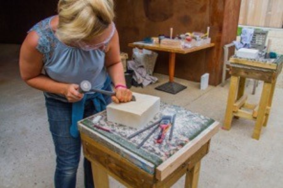 Hard at work carving stone in Dorset