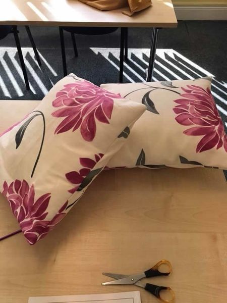 Two beautiful floral scatter cushions made by a recent attendee