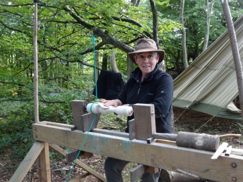 Jacqui using a pole lathe