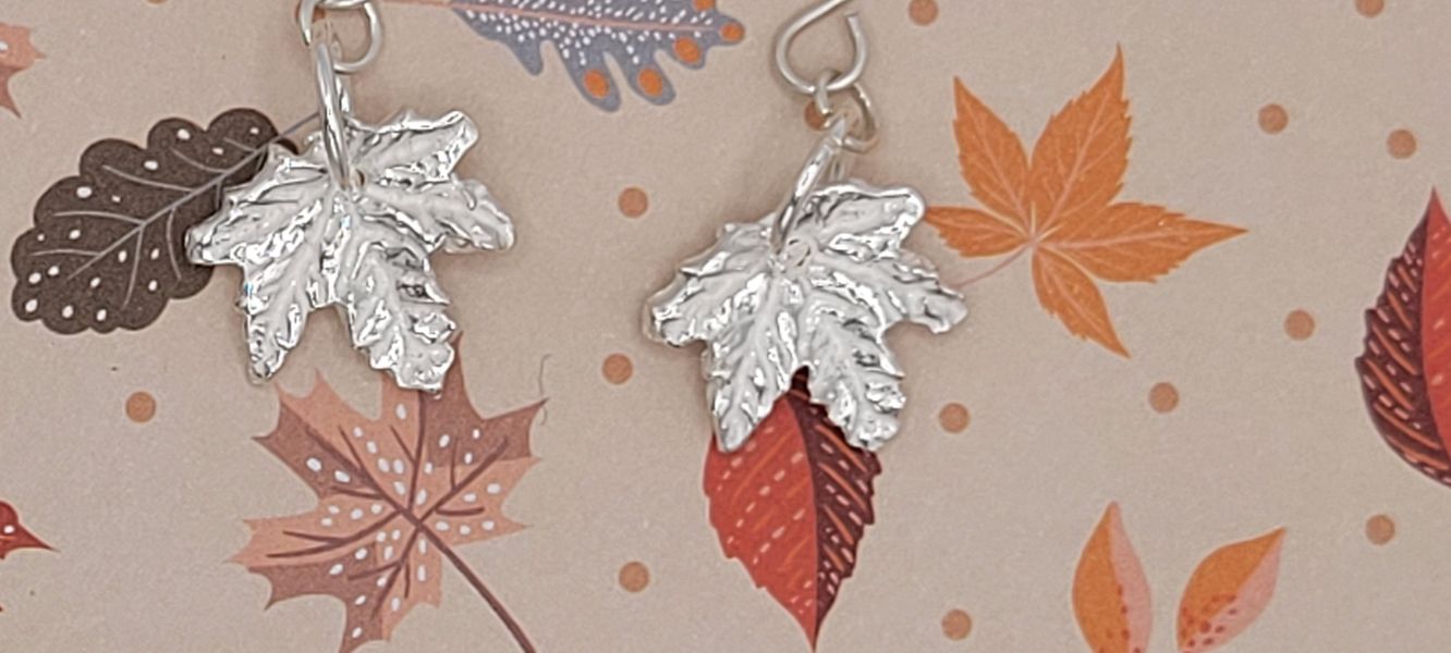 Tiny maple leaf earrings made using pre made mould.