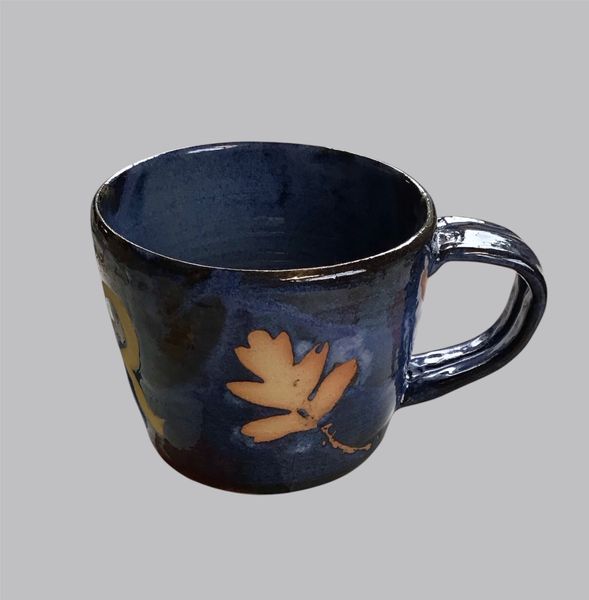 blue resist glazed mug. Afternoon pottery