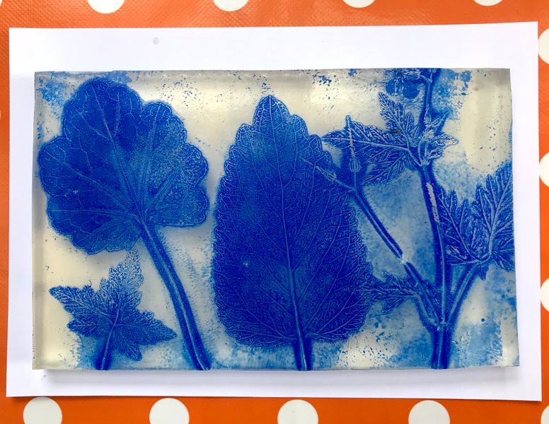 Ghost print on the gel plate, waiting for paper to be added to take a second print