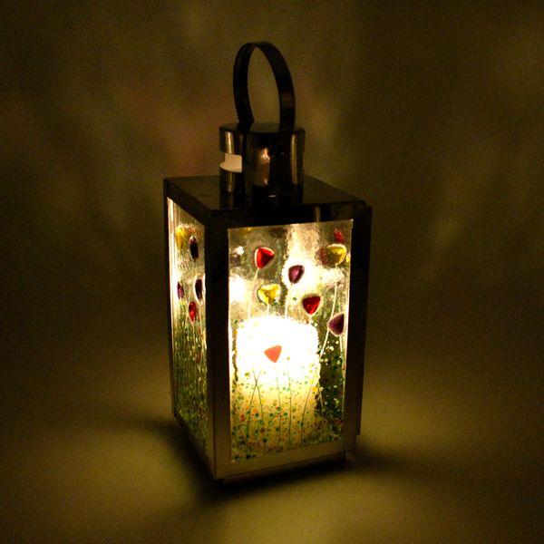 Botanic design lantern by candlelight