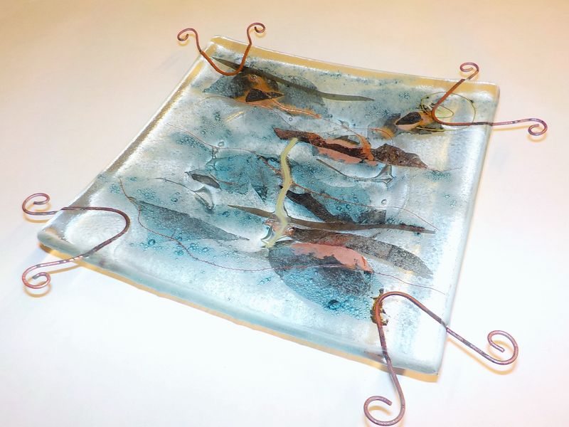 Fused glass with metal inclusions