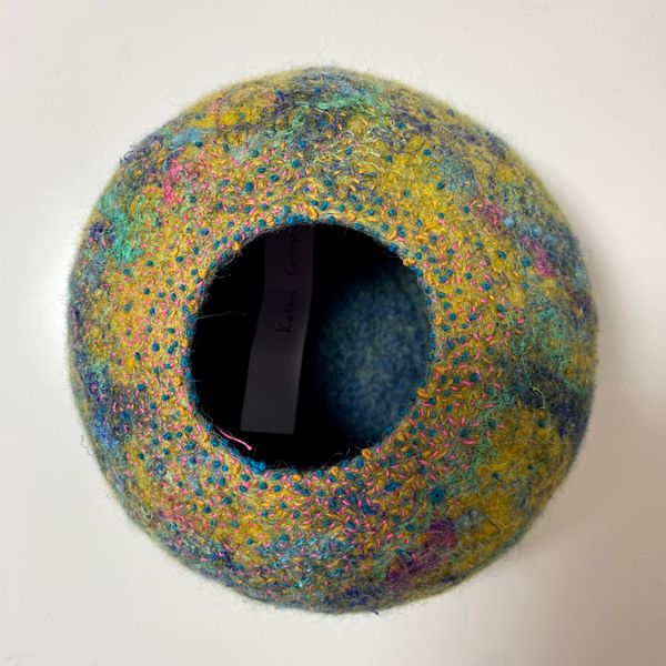 Embroidered felt vessel