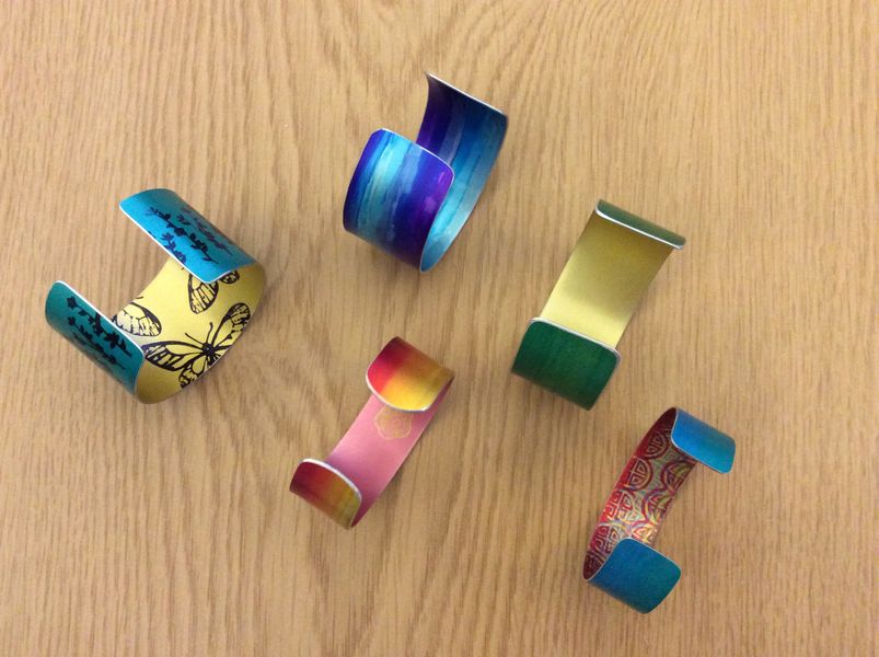 Metal cuffs made from anodised aluminium