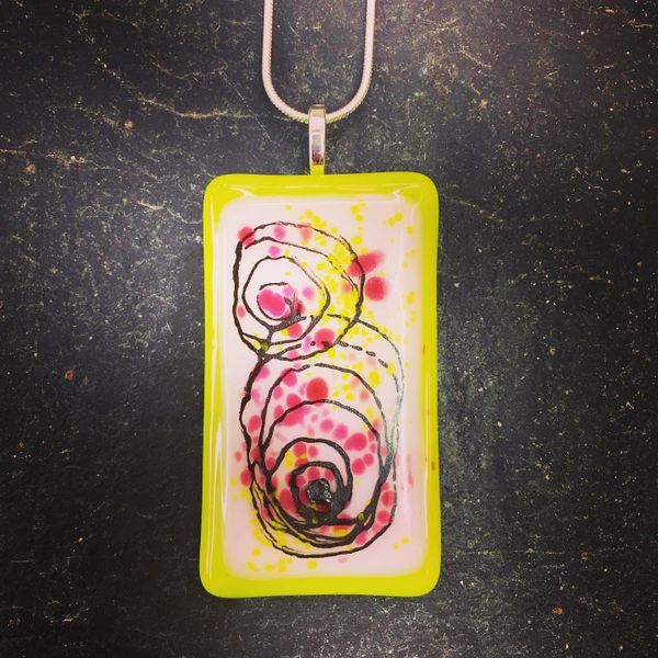 Stylised Roses, a pendant made by Eleanor at Rainbow Glass Studios N16 0JL