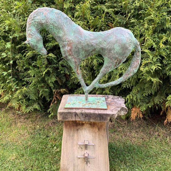 Stunning horse finished in patinated bronze