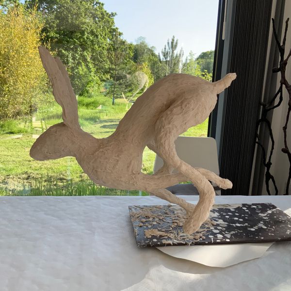large running hare at plaster stage