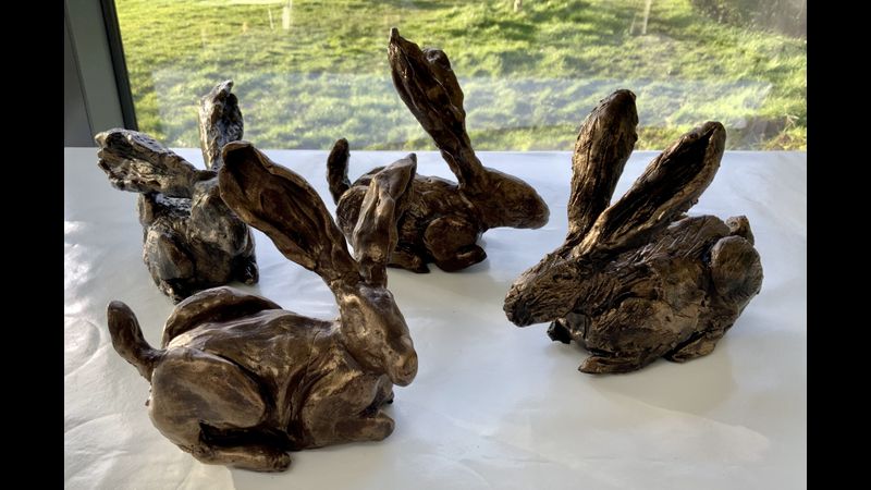 Clay hares bronzed and ready to go home
