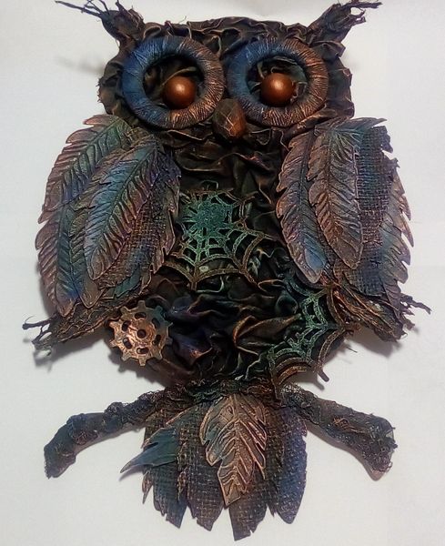 Wall hung Owl - Garden Sculpture which is truly mixed media made from many elements
