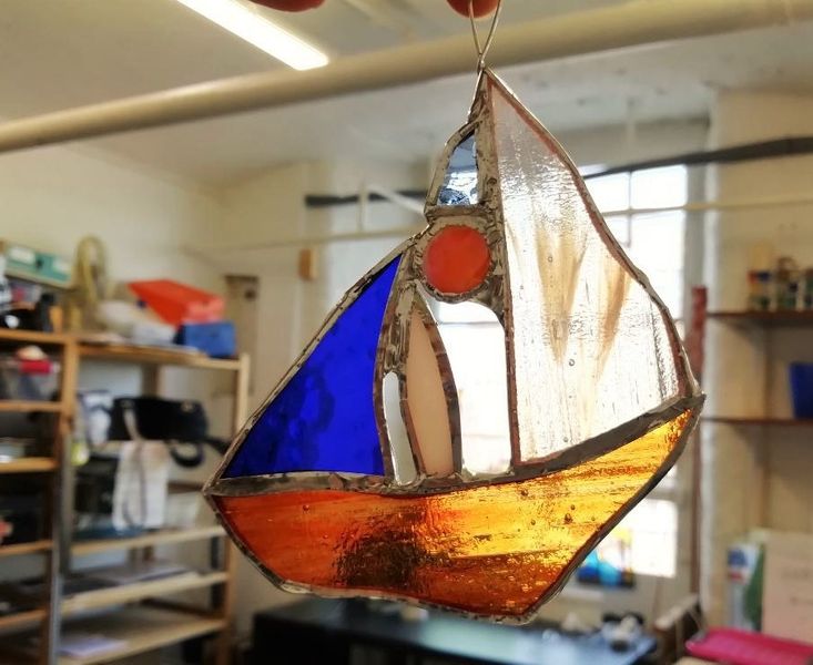 Boat, made by a student, studio in background