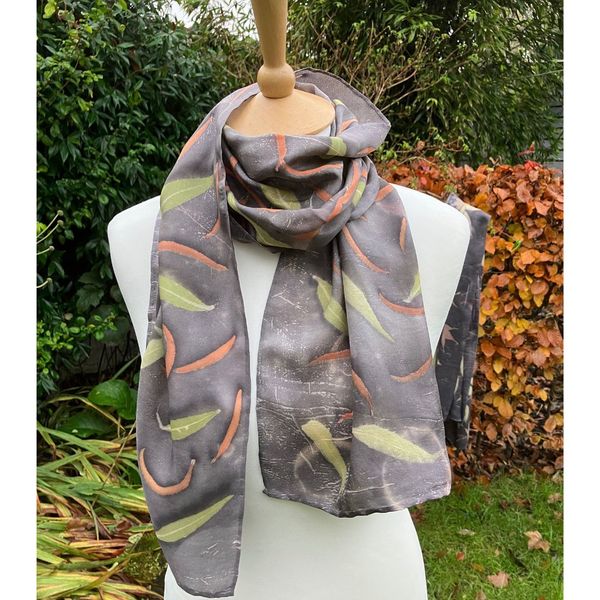 Peace silk scarf printed with buddleia and Eucalyptus Nicholii leaves, dyed with green tea [tannin] and iron